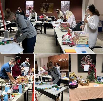 Newry staff wrapping gifts for Applewood Center, Inc. - 2022 review